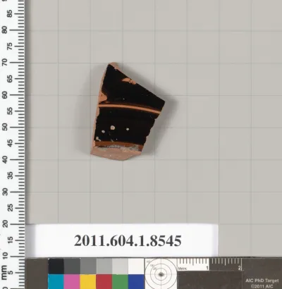 Terracotta fragment of a stemless kylix (drinking cup)