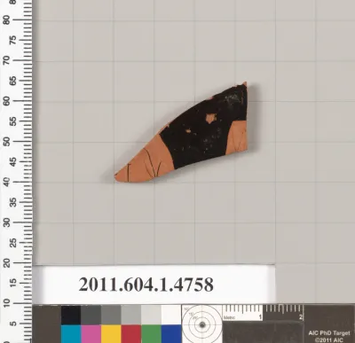 Terracotta fragment of a kylix (drinking cup)