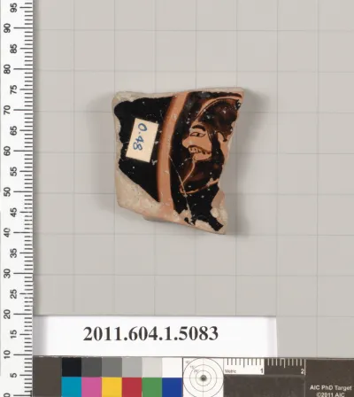 Terracotta fragment of a kylix (drinking cup)