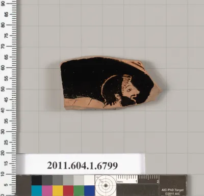 Terracotta fragment of a kylix (drinking cup)