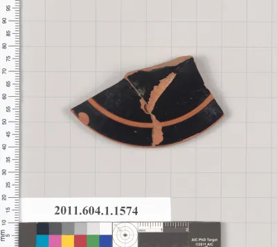 Terracotta fragment of a kylix (drinking cup)