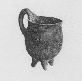 TRIPOD VASE (CYPRIOT, BRONZE AGE, RED POLISHED WARE)