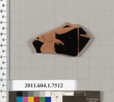 Terracotta fragment of a kylix (drinking cup)