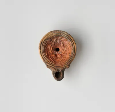 Terracotta oil lamp