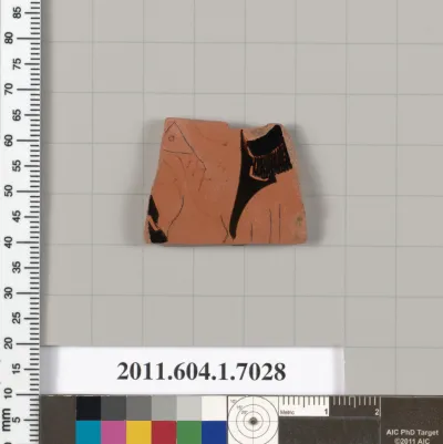 Terracotta fragment of a kylix (drinking cup)