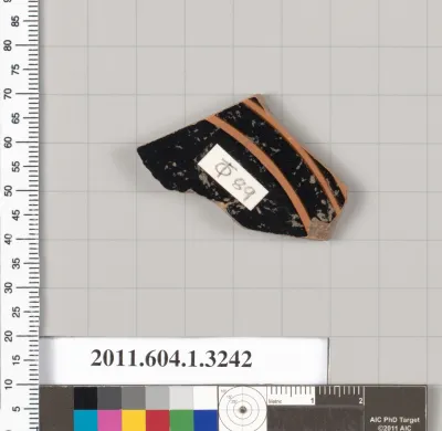 Terracotta fragment of a kylix (drinking cup)