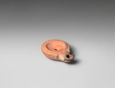 Terracotta oil lamp