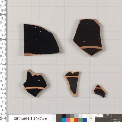 Terracotta fragments of kylikes (drinking cups)