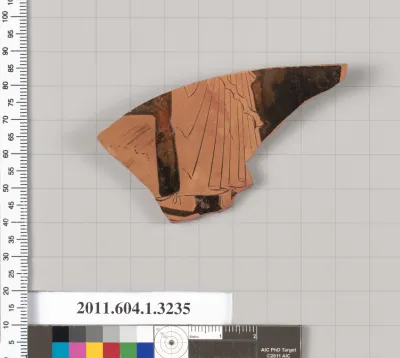 Terracotta fragment of a kylix (drinking cup)