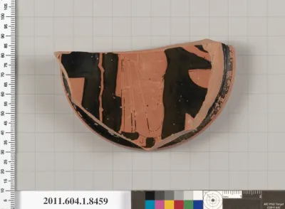 Terracotta fragment of a stemless kylix (drinking cup)