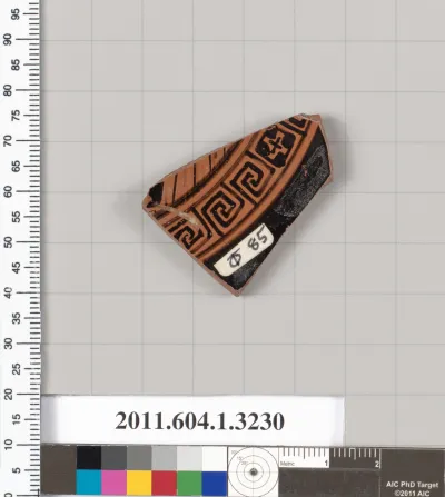 Terracotta fragment of a kylix (drinking cup)