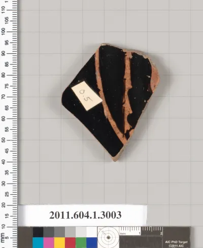 Terracotta fragment of a kylix (drinking cup)