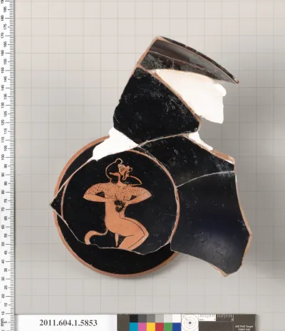 Terracotta fragment of a kylix: eye-cup  (drinking cup)