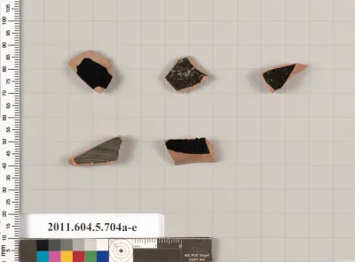 Terracotta fragments of kylikes (drinking cups)