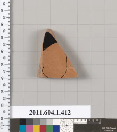 Terracotta fragment of a kylix (drinking cup)