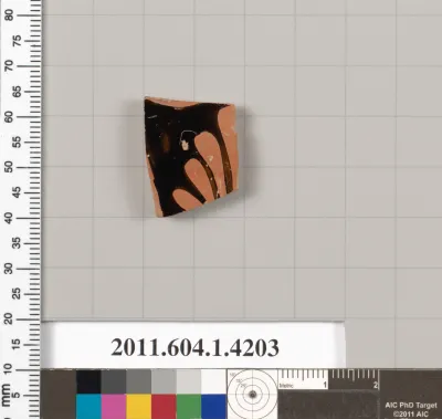 Terracotta fragment of a kylix (drinking cup)