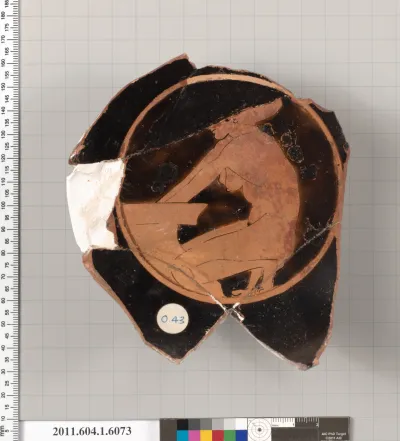 Terracotta fragment of a kylix (drinking cup)