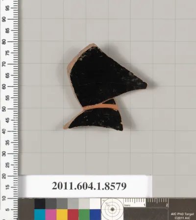 Terracotta fragment of a stemless kylix (drinking cup)