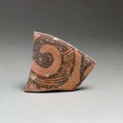 Terracotta rim fragment with spiral design