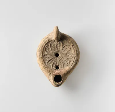 Terracotta oil lamp