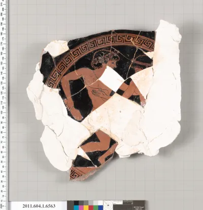 Terracotta fragment of a kylix (drinking cup)