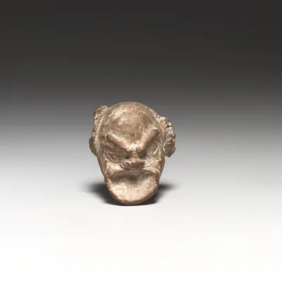 Head of a comic figurine