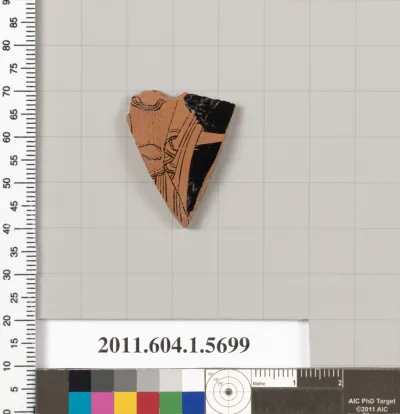 Terracotta fragment of a kylix (drinking cup)