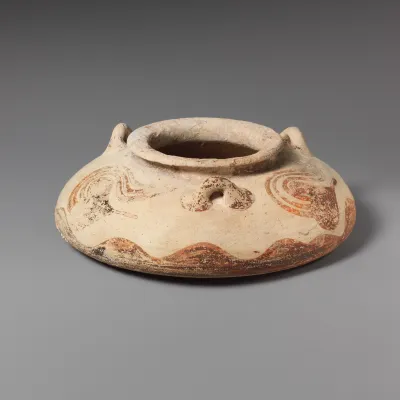 Terracotta squat alabastron (jar)