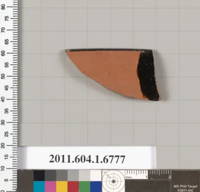 Terracotta fragment of a kylix (drinking cup)