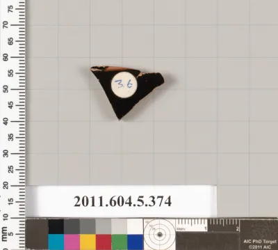 Terracotta fragment of a kylix (drinking cup)