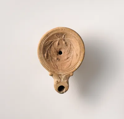 Terracotta oil lamp