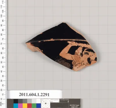 Terracotta fragment of a kylix (drinking cup)