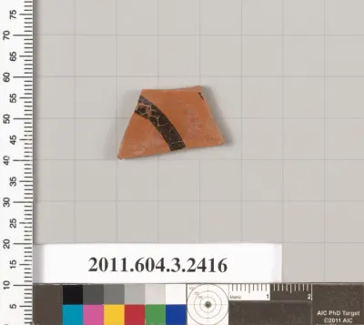 Terracotta fragment of a kylix: eye-cup (drinking cup)