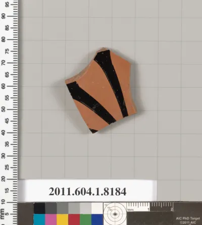 Terracotta fragment of a kylix (drinking cup)