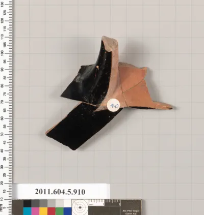 Terracotta fragment of a kylix (drinking cup)