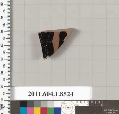 Terracotta fragment of a stemless kylix (drinking cup)