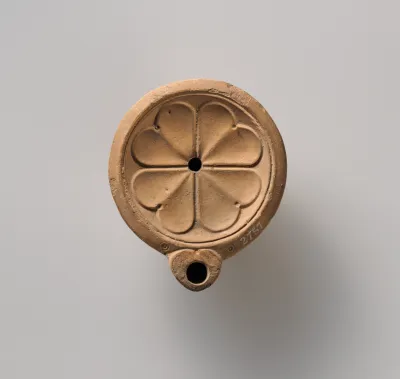 Terracotta oil lamp
