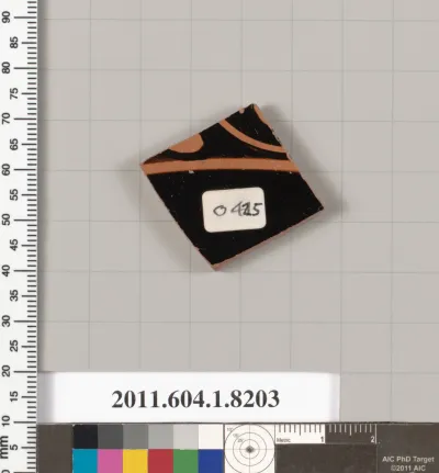 Terracotta fragment of a kylix (drinking cup)