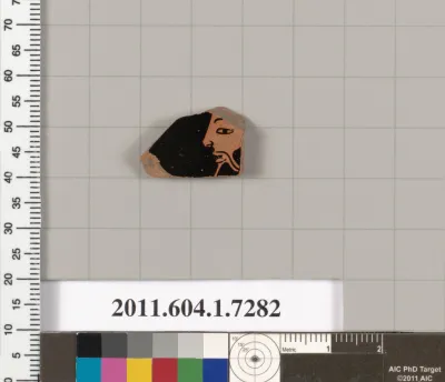 Terracotta fragment of a kylix (drinking cup)