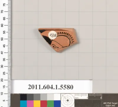 Terracotta rim fragment of a kylix (drinking cup)