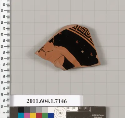 Terracotta fragment of a kylix (drinking cup)