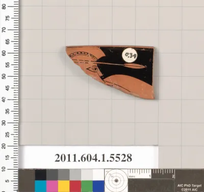 Terracotta rim fragment of a kylix (drinking cup)