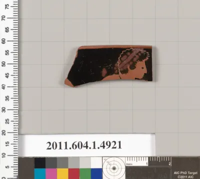 Terracotta rim fragment of a kylix (drinking cup)