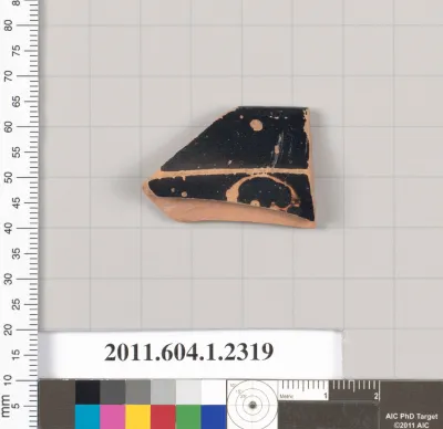 Terracotta rim fragment of a kylix (drinking cup)