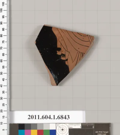 Terracotta fragment of a kylix (drinking cup)