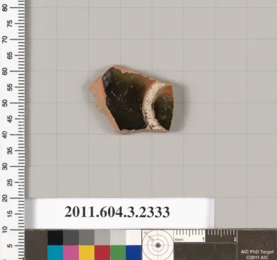 Terracotta fragment of a kylix: eye-cup (drinking cup)