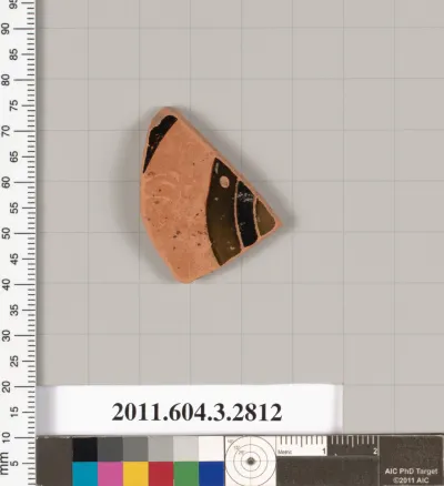 Terracotta fragment of a kylix: eye-cup (drinking cup)