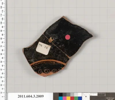 Terracotta fragment of a kylix (drinking cup)