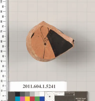 Terracotta fragment of a kylix (drinking cup)