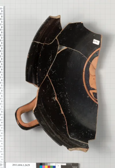 Terracotta fragment of a kylix (drinking cup)